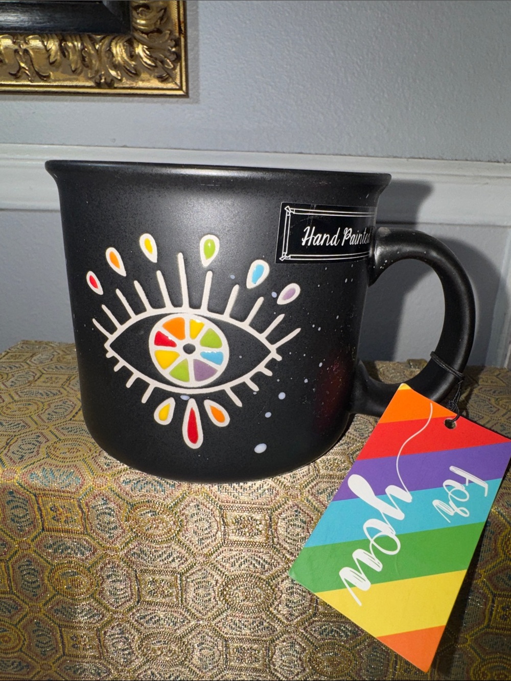 Hand Painted Black Ceramic Mug with Rainbow Eye Design